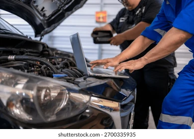 Auto Mechanics Analyzing Car Engine Nw - car workshop repair manual